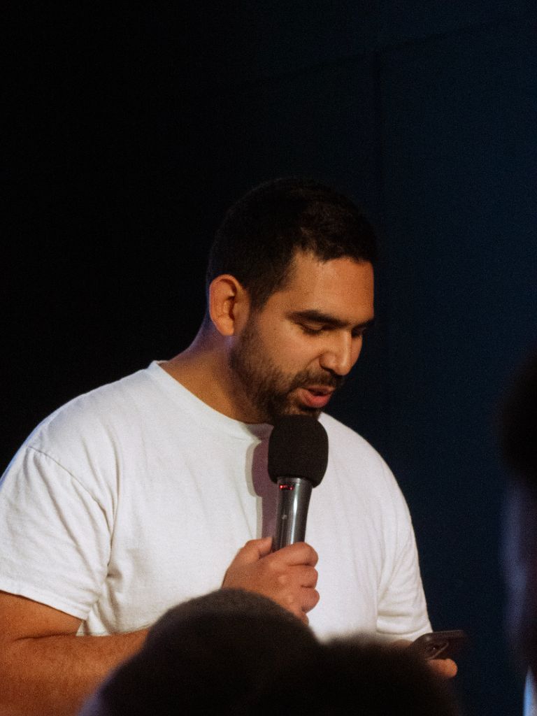 Man speaking at microphone