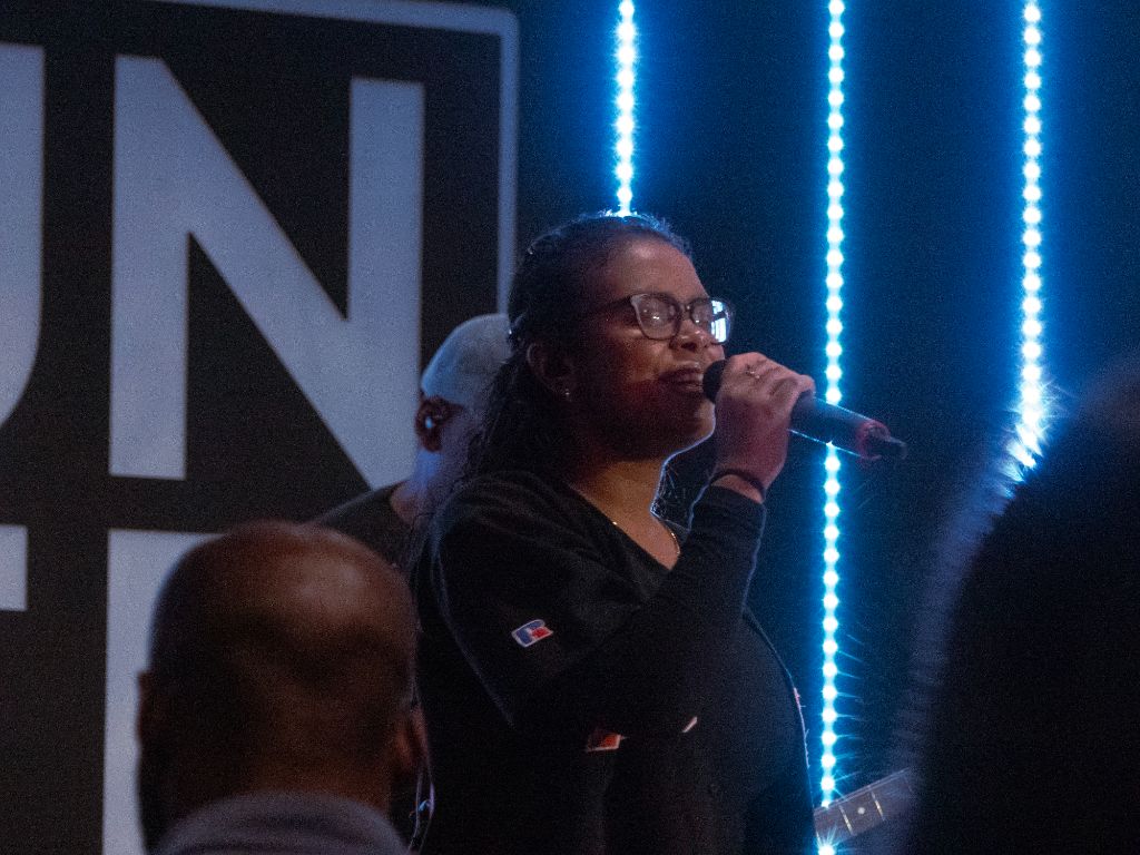 Woman performing with blue lights