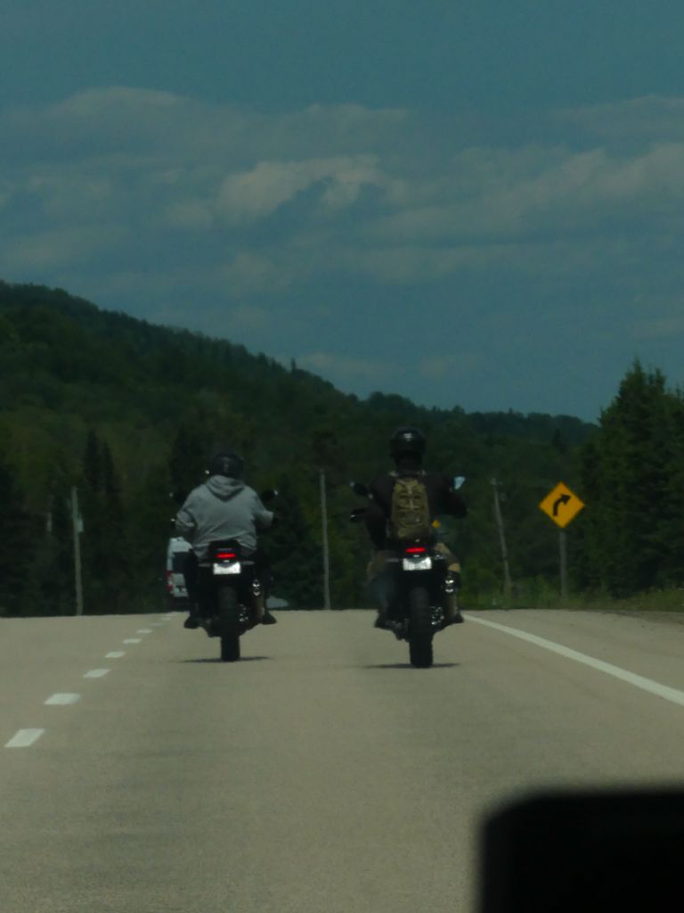 Two motorcyclists on road
