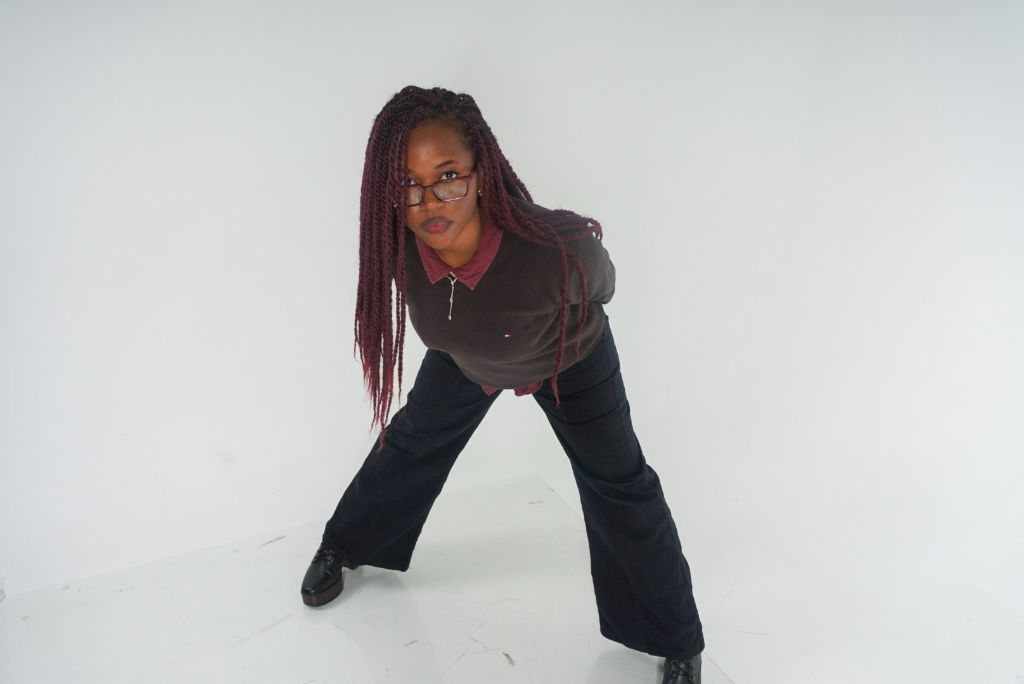 Studio Session — Woman with braids in wide stance