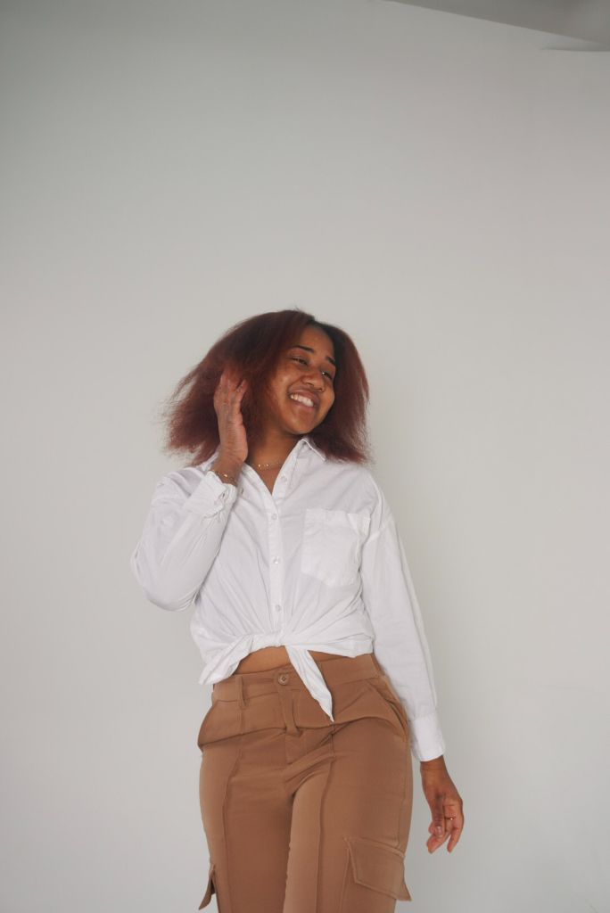 Studio Session — Woman in white shirt laughing